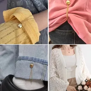 Magnetic clothing clip detail showing sleeve, pants cuff and cardigan fastening usage.