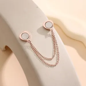 Rose gold magnetic clothing buckle with heart charms and double chains for detail view.