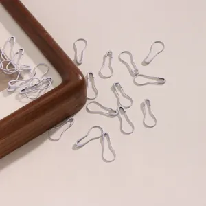 Detailed shot of light purple bulb safety pins gourd pins for clothing accessories and crafts.