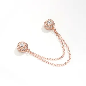 Rose gold magnetic clothing clip with double chain rhinestone design for cardigan or scarf.