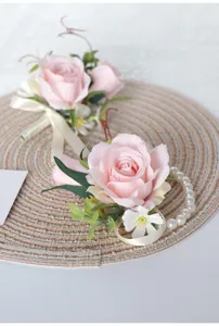 Rosa künstliche Rosen Handgelenk Blume und Boutonniere Set für Hochzeitsbraut Party Dekoration.