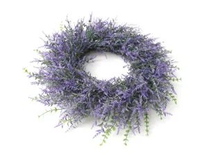 Detailed view of artificial lavender wreath showing dense purple floral texture and green leaves.