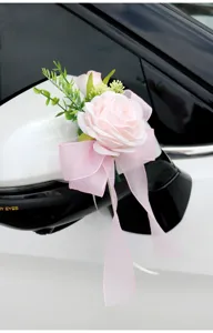 Wedding car rearview mirror flower decoration pink rose bow wedding party decor details shot