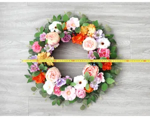 Artificial flower wreath for front door and wall hanging spring summer home decor.