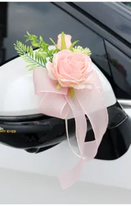 Pink wedding car rearview mirror flower decoration with rose ribbon for wedding party decor.