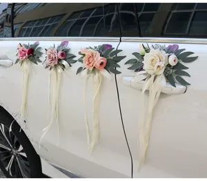 Artificial rose car door flower wedding decoration with ribbons for ceremony event.