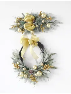 Set di ghirlanda e festone natalizio con fiocchi dorati per decorazioni festive porte.