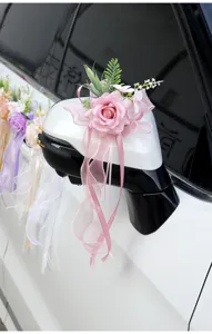 Pink artificial rose flower wedding car rearview mirror decoration bow floral detail shot