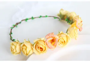 Close-up detail of artificial yellow rose floral crown, ideal for fairy photography and parties.