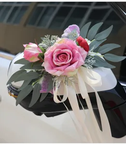 Wedding car rearview mirror artificial rose flower decoration with white ribbon bow.