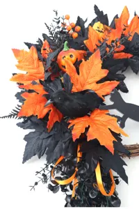 Halloween decorative wreath featuring black raven, pumpkins, and autumn leaves for door.