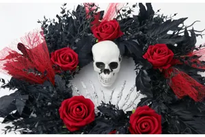 Halloween artificial wreath featuring black leaves, red roses and skull for party wall decor.