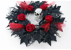 Halloween wreath detail with black leaves red roses mesh ribbon and skull decor 35cm