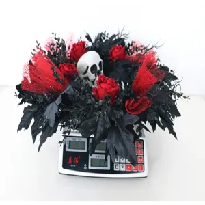 Halloween wreath with black red roses and skull for spooky party decor front door wall hanging.