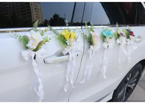 Artificial wedding car door flower decoration set with colorful calla lilies and white ribbon bows.