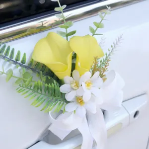 Artificial flower wedding car decor bow ribbon floral arrangement for door handle celebration.