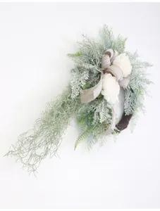 Artificial green plant hanging wreath detail, ideal for door and wall home decoration.