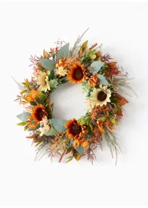 Artificial autumn sunflower wreath detail, vintage harvest festival door hanging home decor.