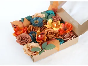 Detalle de la caja de rosas artificiales con flores coloridas para un hermoso diseño floral.
