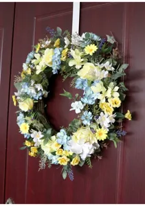 Beautiful artificial spring floral wreath for front door wall hanging home decor detail view