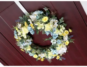 Spring artificial floral wreath detail, vibrant door and wall hanging decor for home decor.