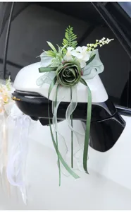 Wedding car rear-view mirror artificial flower decoration with green rose and ribbons.
