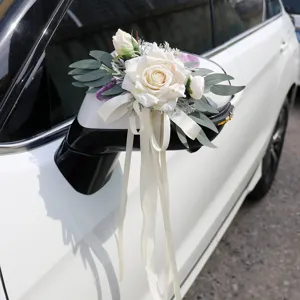 Wedding car rearview mirror artificial rose flower decoration with white ribbons.