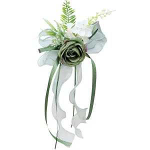 Elegant artificial flower decoration with green rose and ribbons for wedding cars, door handles.