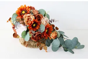 Bridal wedding waterfall bouquet with artificial sunflowers, roses and eucalyptus.