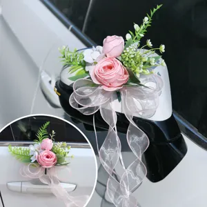 Artificial rose wedding car mirror decoration with pink ribbon for wedding ceremony setup.