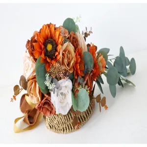 Detail view of artificial sunflower and rose cascade bridal bouquet with eucalyptus leaves.