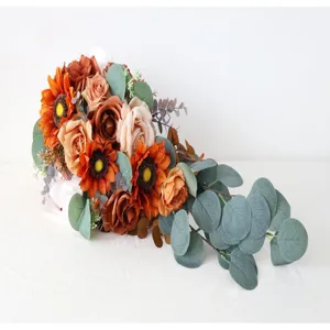 Artificial wedding bridal bouquet with sunflowers roses and cascading eucalyptus leaves for party