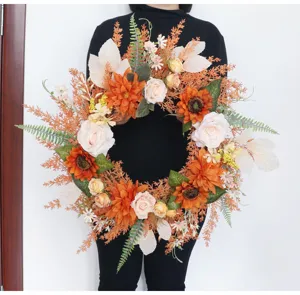 Autumn artificial floral wreath detail shot, perfect for home wall and festival window decor.