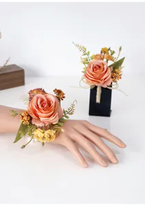 Artificial flower wedding wrist corsage and boutonniere set, elegant peach rose design.