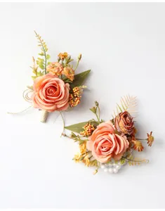 Exquisite artificial rose wrist flower and boutonniere set for wedding party details view.