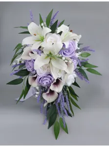 Artificial wedding teardrop bouquet with roses lilies and lavender for bridal photography.
