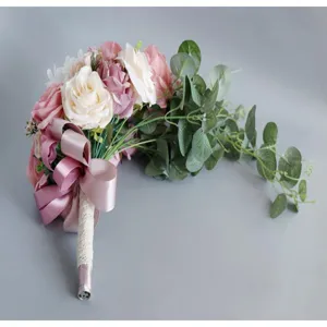 Artificial cascading bridal bouquet for western wedding ceremonies, stunning pink and white roses.