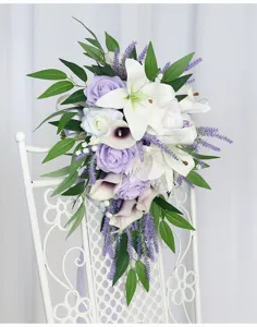 Cascade bridal bouquet with artificial white lilies, purple roses, and lavender for wedding.