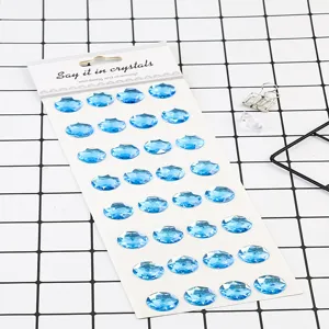 Blue round acrylic crystal rhinestone stickers for DIY phone and car decoration crafts.