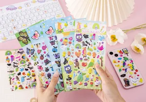 Detailed view of cute cartoon 3D puffy stickers with various cute animal and butterfly patterns.