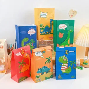 Sacchetti regalo in carta con dinosauri di cartone animato per feste di compleanno bimbi.