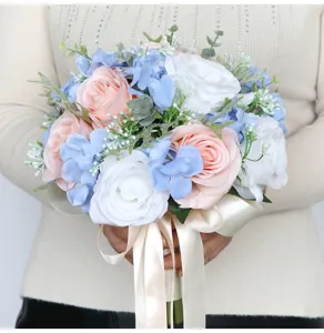 Korean style artificial wedding bridal bouquet with pink blue and white roses for photography.