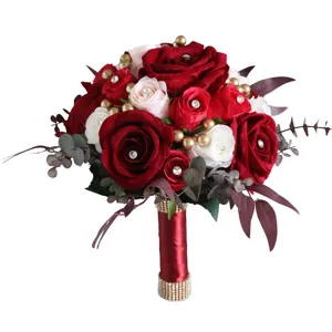 Stunning wedding bridal bouquet featuring red and white artificial roses rhinestones and pearls.