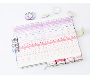 Detailed view of colorful washi tape set, ideal for DIY scrapbooking and daily decoration.