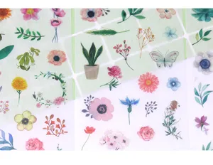 Watercolor flower decorative stickers detail view, colorful botanical designs for journals.