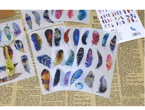 Dreamy feather washi stickers detail shot, perfect for journaling and art decoration.