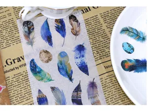 Detailed view of dreamy feather washi stickers, colorful feather patterns for journal design.