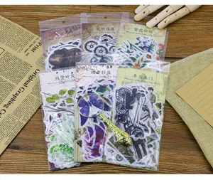 Vintage washi sticker pack detail shot featuring various antique designs for DIY journaling.