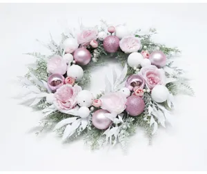 Pink Christmas wreath with floral and bauble decorations for home door wall hanging.