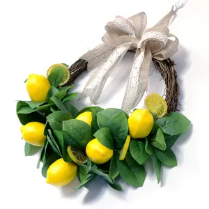 Ghirlanda di limoni finta con foglie verdi e fiocco in juta per decorazione domestica